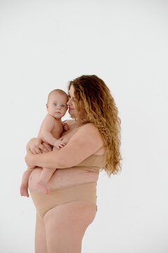 plus size mom with her baby