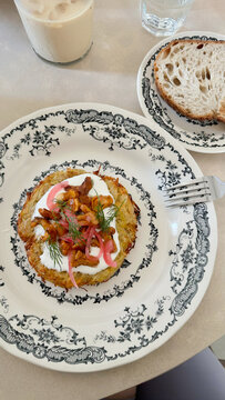 Potato Rosti With Chanterelles and Sour Cream on Vintage Plate