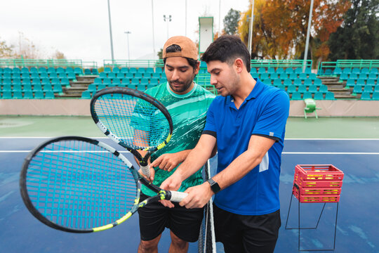 Tennis Coach Explains Grip Techniques During Private Lesson