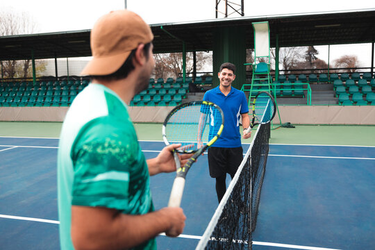 Friendly Sportsmanship After a Tennis Match