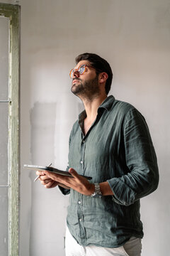 Architect Evaluating Interior Space