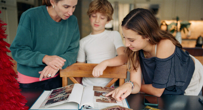 Family looking at pictures