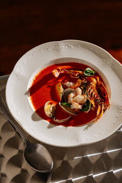 Seafood stew with prawns and clams in red sauce