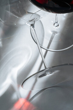  Close-up of wine glass stems with reflections