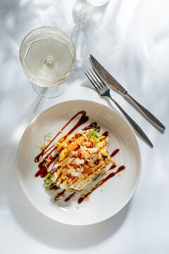 Title:Shrimp omelette with sliced almonds and sauce - Descripti