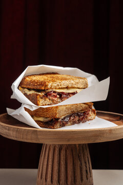 Grilled sandwich with melted cheese and caramelized onions