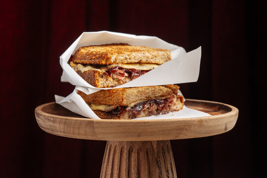 Grilled sandwich with melted cheese and caramelized onions