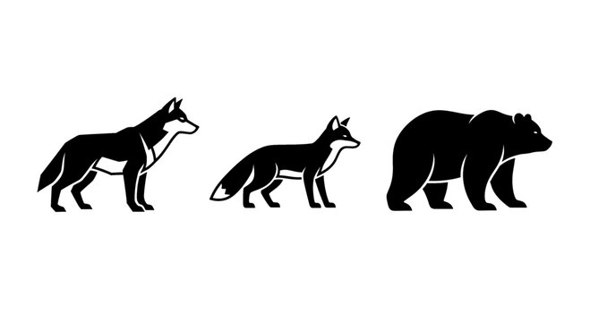 Silhouettes of a wolf, fox, and bear standing side by side