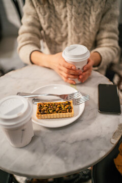 Pistachio Tart and Coffee on  Table