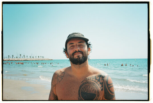 Tattooed Man on Bogatell Beach, Spain