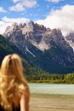 Italy Woman admiring Dolomites Summer travel