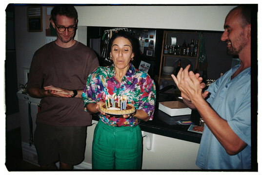 Celebrating a Birthday With Friends and Cake at Home