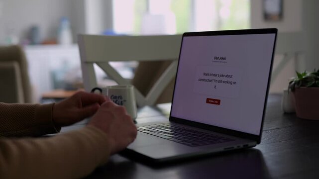 Middle Aged Man Testing Classic Dad Joke Generator Web Application - Dad Jokes On Demand Comic Relief Concept