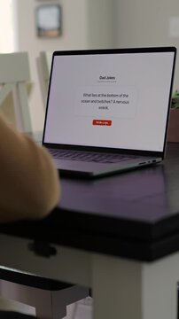 Middle Aged Man Testing Classic Dad Joke Generator Web Application - Dad Jokes On Demand Comic Relief Concept