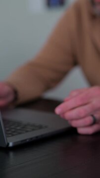 Middle Aged Man Testing Classic Dad Joke Generator Web Application - Dad Jokes On Demand Comic Relief Concept