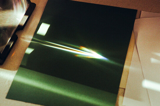 Prism Light Refraction on Desk