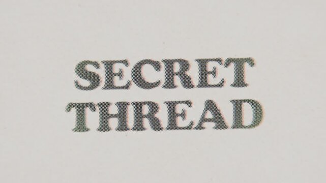CMYK Halftone Text Secret Thread Printed on Changing Paper with Vintage Stop Motion Effect.
