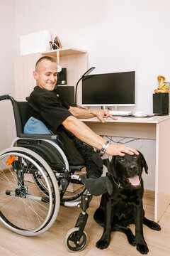 A man with a dog.