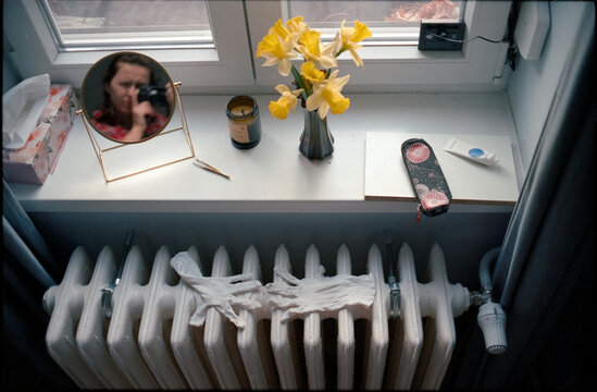 Self portrait at the window