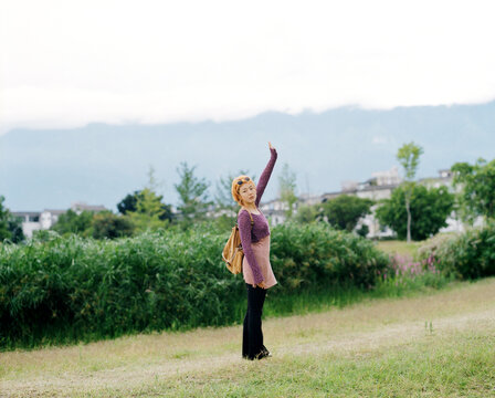 Reaching Up in Open Landscape