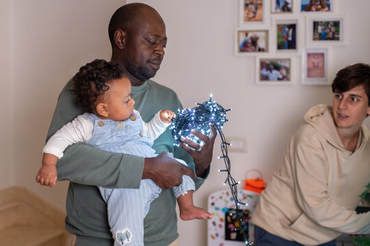 Family Decorates Home With Lights and Enjoys Time Together