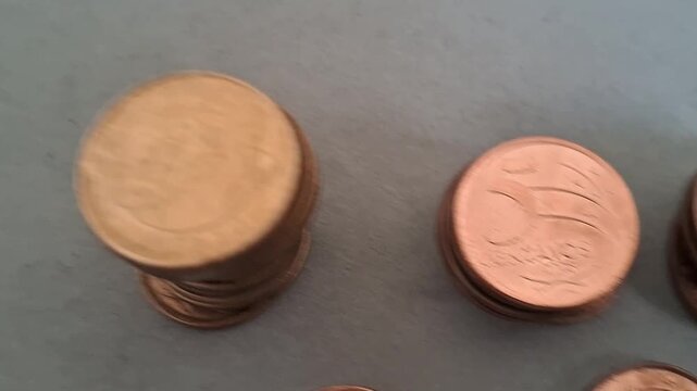 Brazilian centavos currency coins displaying various denominations in a detailed close-up motion footage.