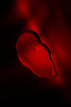 skincare lotion smear over red background