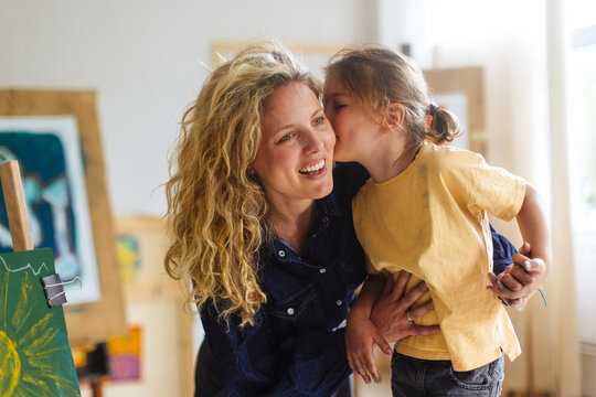Mother and Child Share Happy Moment in Art Studio