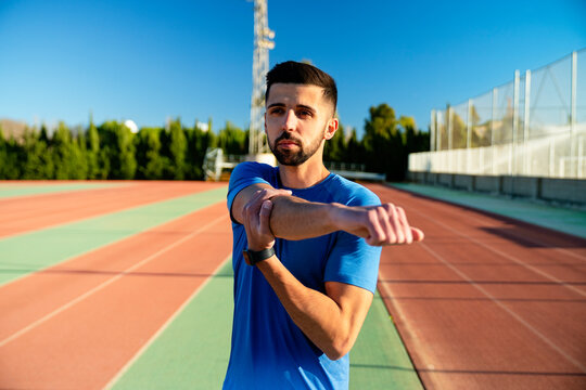 athlete doing stretches