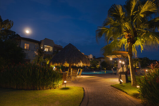 Night view of a luxury resort with ambient lighting.