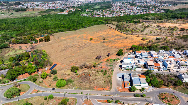 Aerial view of small farms and houses near the AMBEV brewery in the satellite city of Taguatinga. Federal District, Brazil, 2025.