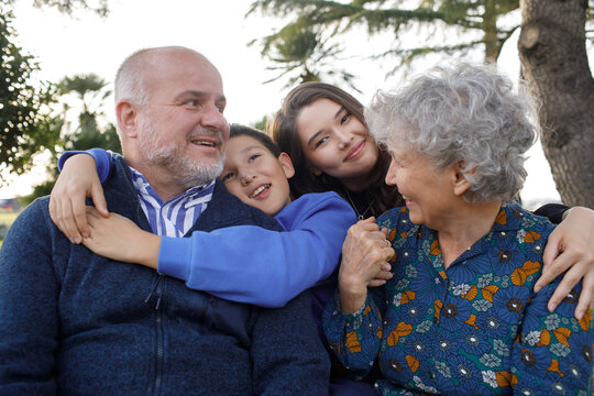 Grandchildren and grandparents in the park