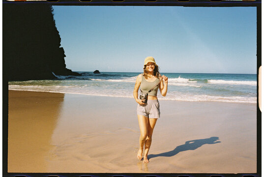 tourist enjoying kauai beach 