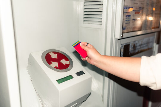 Woman using transportation card 