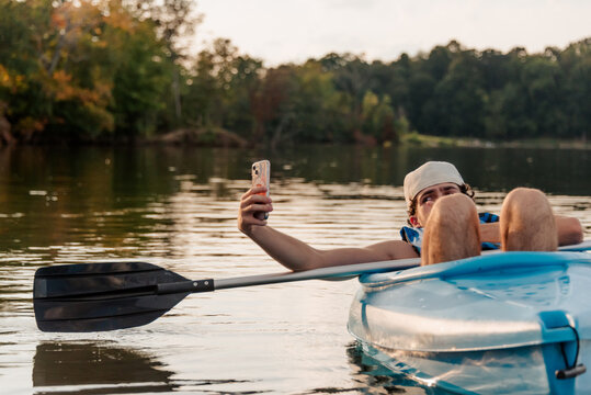 Teen boy kayaking 
