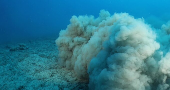 sand underwater moving making shapes  no gravity like sand storms and clouds