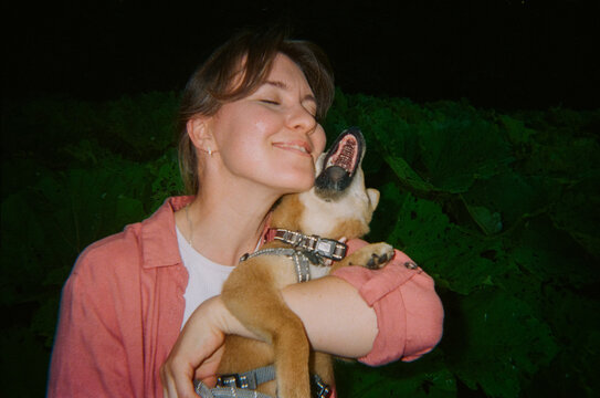 Woman Hugging Shiba Inu