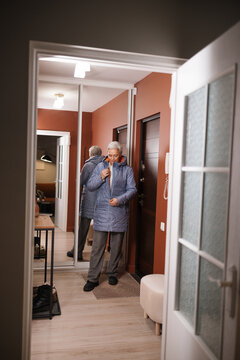 A woman in the hallway at home