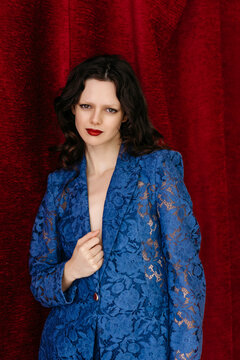 Woman  in blue lace blazer 