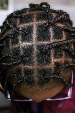 Hair styling with braids.
