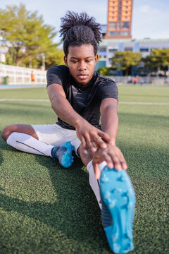 Athlete stretching before practice