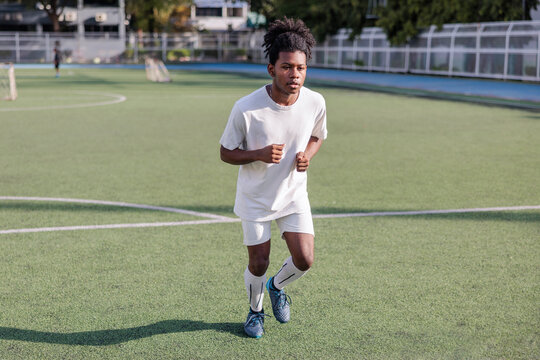 Athlete warming up on a field