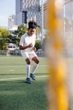 Soccer player practices drills on the field