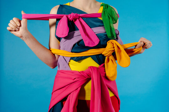 Creative Styling with Bright Fabrics Tied Around  Body in Studio