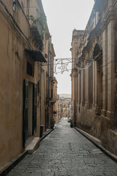 Empty Narrow Cobblestone Street in Old Town