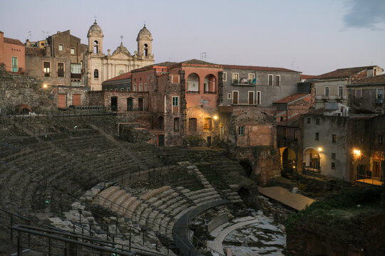 Historic Cityscape at Dusk with Illuminated Old Town