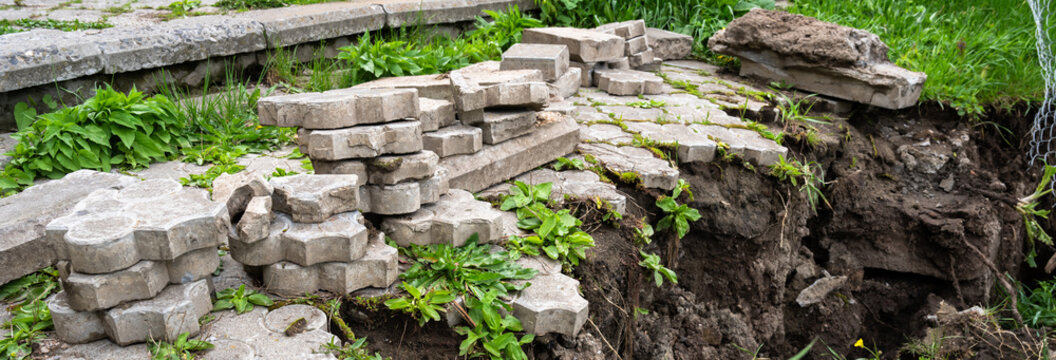 Yard Tiles Damaged by Recent Landslide