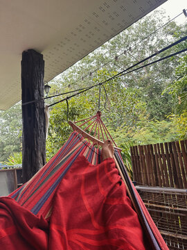 anonymous person's feet in a hammock 