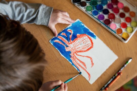 Child Painting Artwork at Home