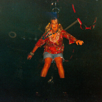 Dancer on roller skates at 1970's fun dress up party